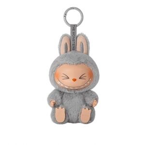 Labubu 'Have A Seat' Collectible Figure “HeHe”